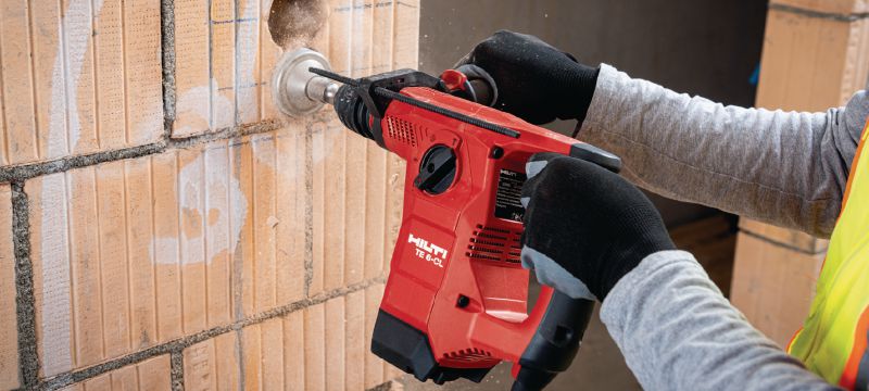 TE 6-CL perforators Jaudīgs SDS Plus (TE-C) sērijas perforators ar D veida rokturi ar atkalšanas funkciju Pielietojumi 1
