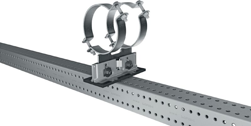MP-PS 2-2 caurules atbalsts Regulējami divkārši caurules atbalsti ar pārklājumu, kas paredzēts ārpus telpām; paredzēti 21–328 mm (1/2 to 12) diametra cauruļu stiprināšanai pie dažādiem pamatmateriāliem vidēji korozīvā vidē